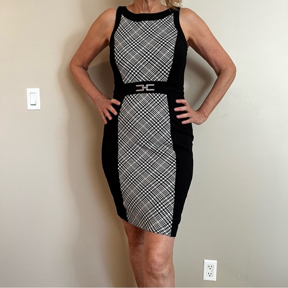 White House/Black Market Dresses & Skirts - Chic Black and White Sleeveless Midi Dress